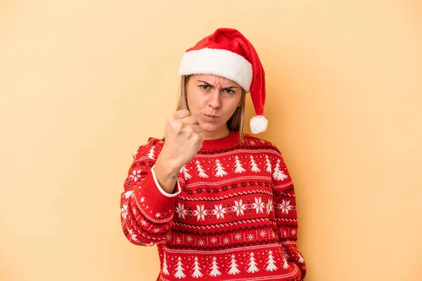 Young Caucasian Woman Celebrating Christmas Isolated Yellow Background Showing Fist — Stock Photo, Image