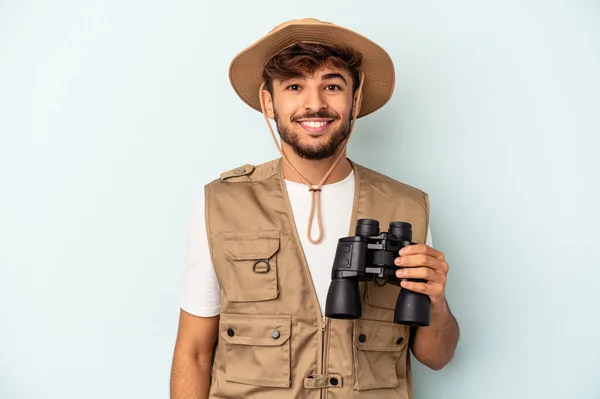 Young Mixed Race Man Holding Binoculars Isolated Blue Background Happy — ストック写真
