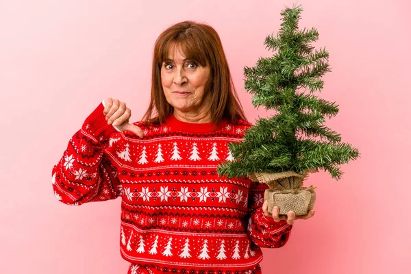 Middle Age Caucasian Woman Holding Christmas Tree Isolated Pink Background — Stock Photo, Image
