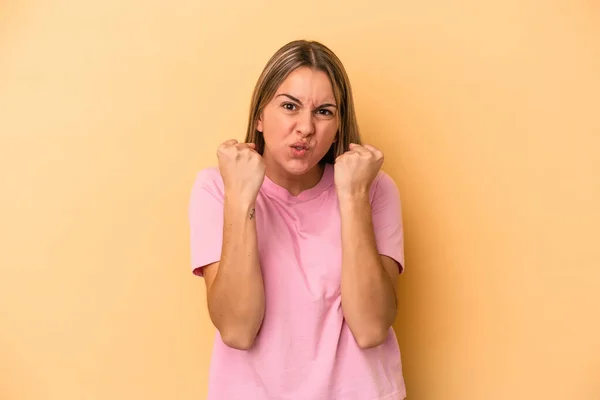 Young Caucasian Woman Isolated Yellow Background Showing Fist Camera Aggressive — Stock Photo, Image