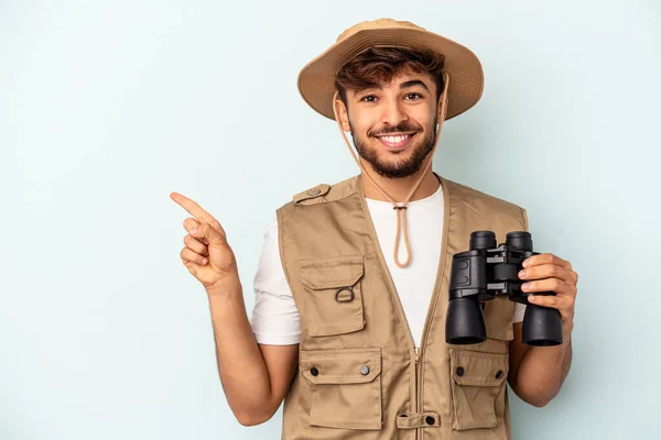 Young Mixed Race Man Holding Binoculars Isolated Blue Background Smiling — 图库照片