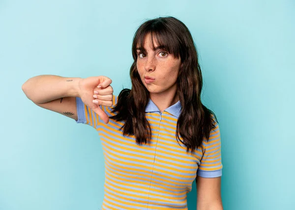 Young Argentinian Woman Isolated Blue Background Showing Thumb Disappointment Concept —  Fotos de Stock