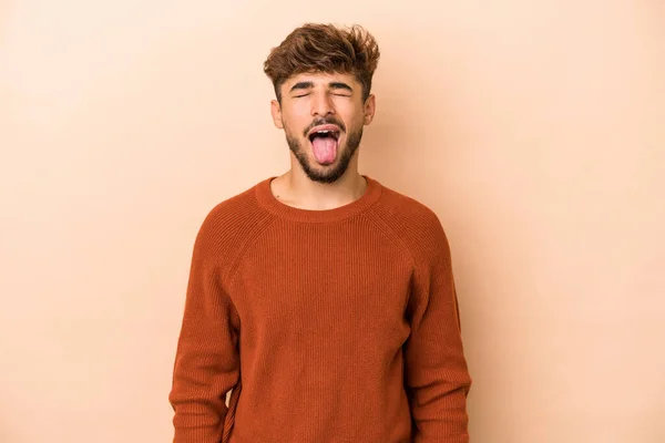 Young Arab Man Isolated Beige Background Funny Friendly Sticking Out — 스톡 사진