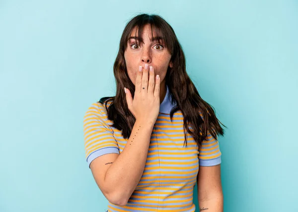 Young Argentinian Woman Isolated Blue Background Shocked Covering Mouth Hands —  Fotos de Stock