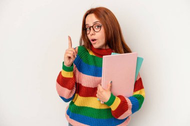 Young student caucasian woman isolated on white background having an idea, inspiration concept.