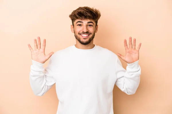 Young Arab Man Isolated Beige Background Showing Number Ten Hands — Stockfoto