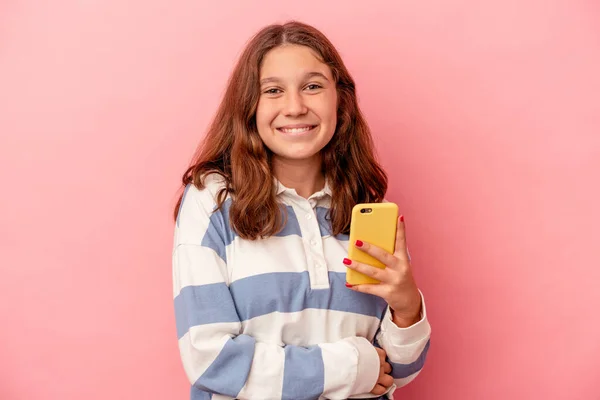 Little Caucasian Girl Holding Mobile Phone Isolated Pink Background Laughing — Stock Photo, Image