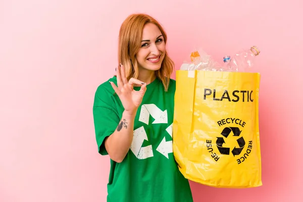 Young Caucasian Woman Recycled Plastic Isolated Pink Background Cheerful Confident — Stockfoto