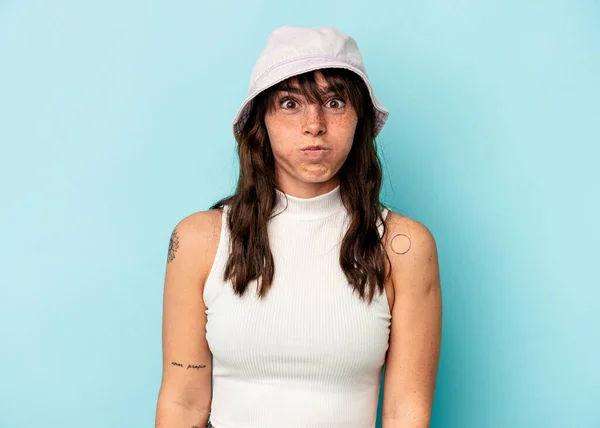 Young Argentinian Woman Isolated Blue Background Blows Cheeks Has Tired — 스톡 사진