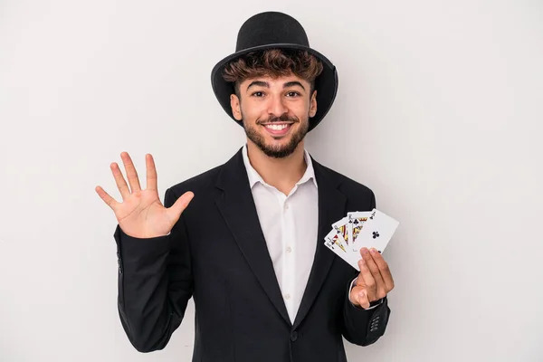 Young Arab Wizard Man Holding Magic Cards Isolated White Background — Stock fotografie