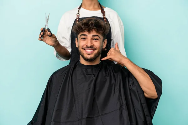 Young Arab Man Ready Get Haircut Isolated Blue Background Showing — Fotografia de Stock