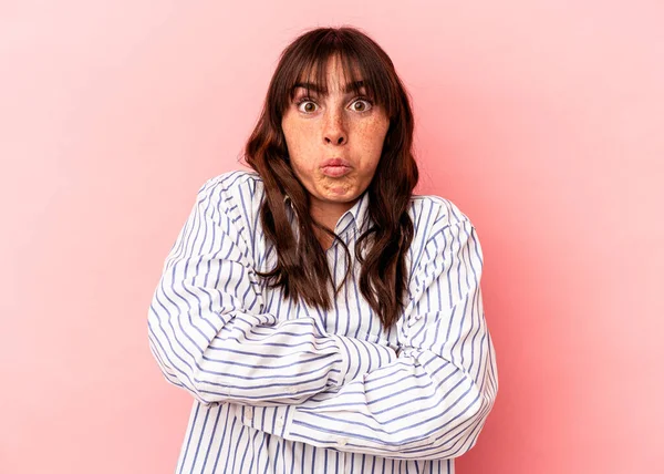 Young Argentinian Woman Isolated Pink Background Blows Cheeks Has Tired — Foto de Stock