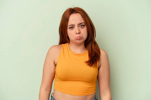 Young Caucasian Woman Isolated Green Background Sad Serious Face Feeling — Stock Photo, Image