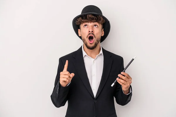 Young Arab Wizard Man Holding Wand Isolated White Background Pointing — Stock fotografie