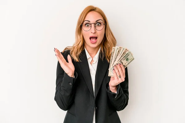 Young Business Caucasian Woman Holding Banknotes Isolated White Background Surprised — 图库照片