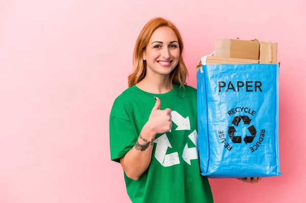 Young Caucasian Woman Recycled Paper Isolated Pink Background Smiling Raising — Stok Foto