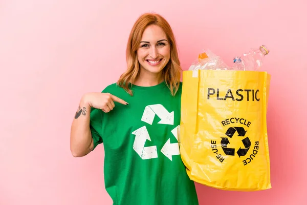 Young Caucasian Woman Recycled Plastic Isolated Pink Background Person Pointing — Foto Stock