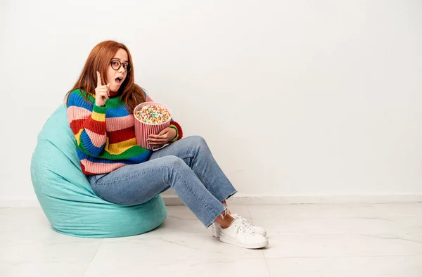 Young Caucasian Woman Sitting Puff Popcorns Isolated White Background Having — Fotografia de Stock