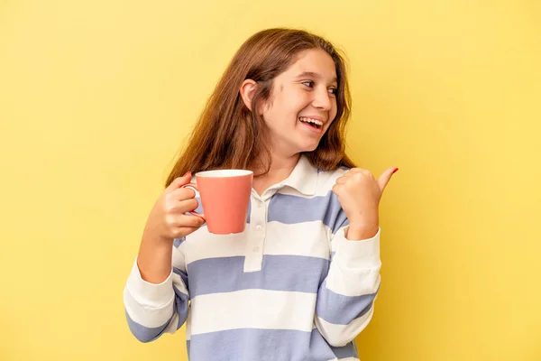 Little Caucasian Girl Holding Pink Mug Isolated Yellow Background Points — Photo