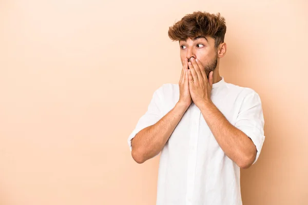 Young Arab Man Isolated Beige Background Thoughtful Looking Copy Space — Stockfoto