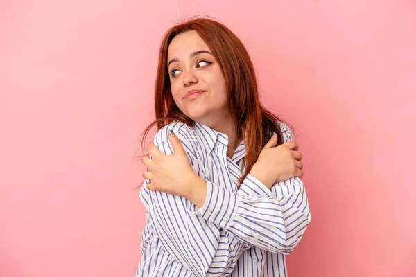 Young Caucasian Woman Isolated Pink Background Hugs Smiling Carefree Happy — Stock Photo, Image