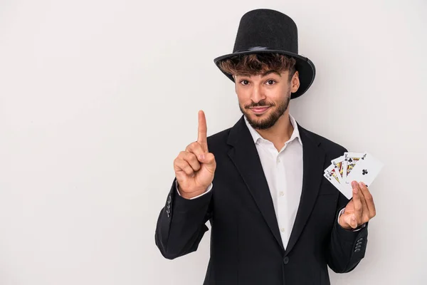 Young Arab Wizard Man Holding Magic Cards Isolated White Background — Zdjęcie stockowe