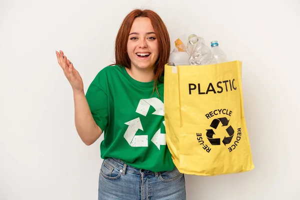 Young Caucasian Woman Recycled Plastic Isolated White Background Receiving Pleasant — Foto Stock