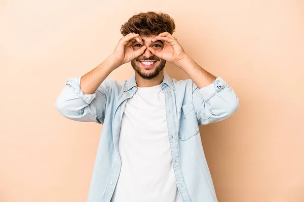 Young Arab Man Isolated Beige Background Showing Okay Sign Eyes — Stock fotografie