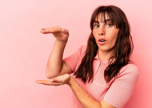 Young Argentinian Woman Isolated Pink Background Shocked Amazed Holding Copy — стокове фото