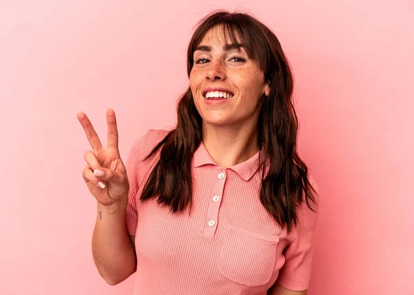 Young Argentinian Woman Isolated Pink Background Showing Victory Sign Smiling —  Fotos de Stock