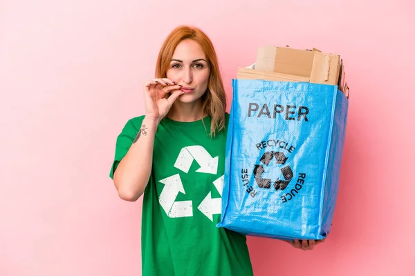 Young Caucasian Woman Recycled Paper Isolated Pink Background Fingers Lips — Foto de Stock