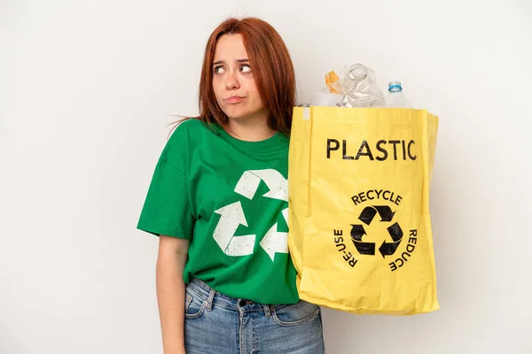 Young Caucasian Woman Recycled Plastic Isolated White Background Confused Feels — Fotografia de Stock