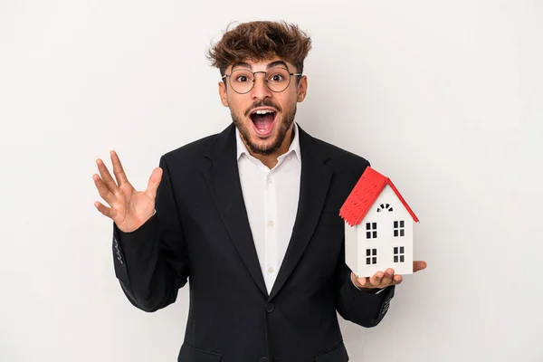 Young Arab Real Estate Man Holding Model House Isolated Isolated — Stock Photo, Image