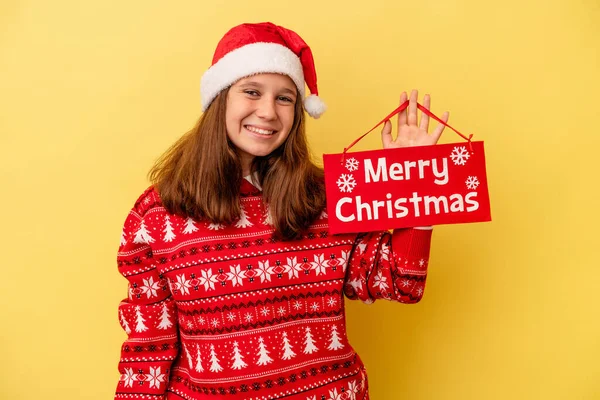 Little Caucasian Girl Holding Merry Christmas Placard Isolated Yellow Background — 스톡 사진