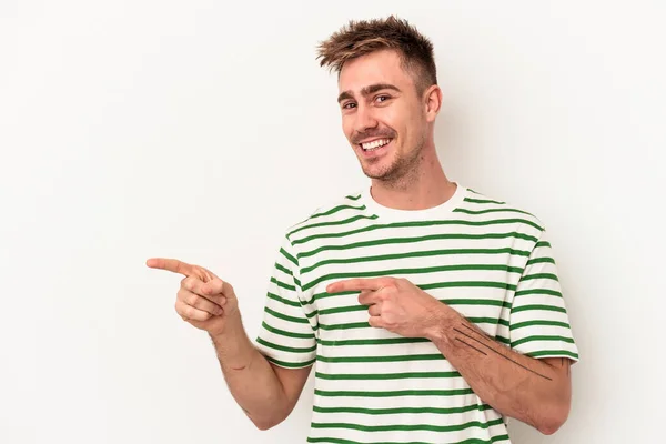 Young Caucasian Man Isolated White Background Excited Pointing Forefingers Away — Stock Photo, Image