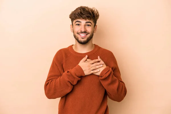 Young Arab Man Isolated Beige Background Has Friendly Expression Pressing — Fotografia de Stock