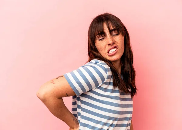 Young Argentinian Woman Isolated Pink Background Suffering Back Pain —  Fotos de Stock