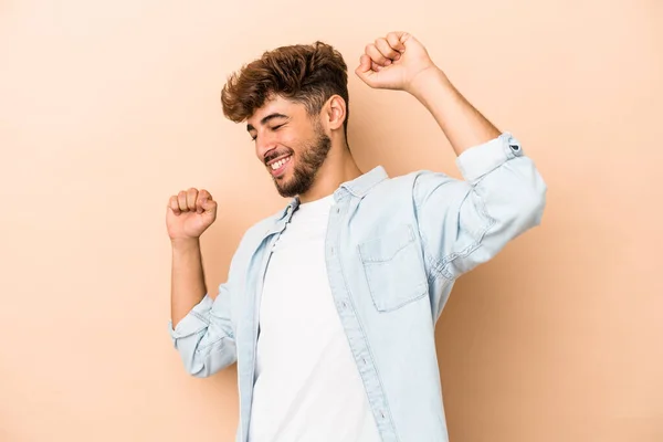 Young Arab Man Isolated Beige Background Celebrating Special Day Jumps — Φωτογραφία Αρχείου