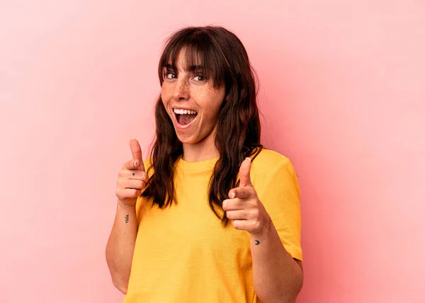 Young Argentinian Woman Isolated Pink Background Pointing Front Fingers — стоковое фото