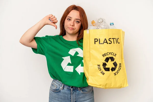 Young Caucasian Woman Recycled Plastic Isolated White Background Showing Dislike — Stockfoto