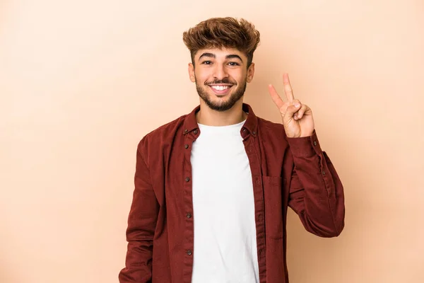 Young Arab Man Isolated Beige Background Showing Number Two Fingers — Stockfoto