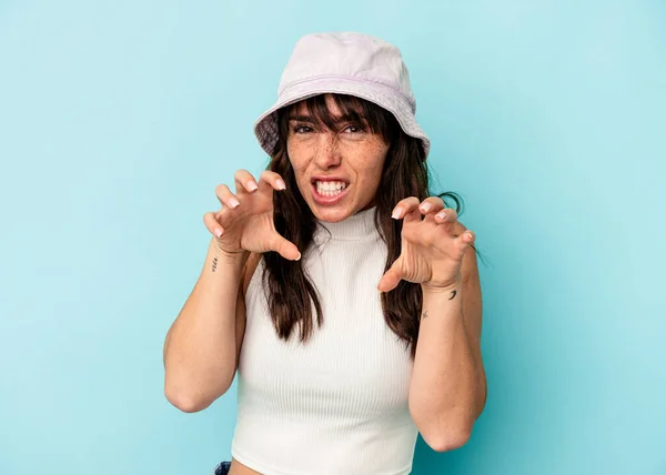 Young Argentinian Woman Isolated Blue Background Showing Claws Imitating Cat —  Fotos de Stock