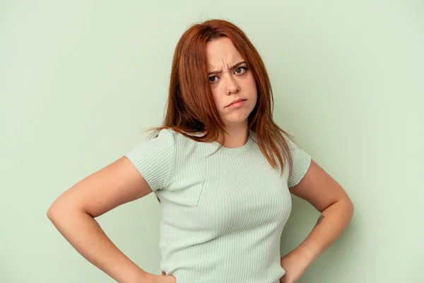 Young Caucasian Woman Isolated Green Background Frowning Face Displeasure Keeps — Stock Photo, Image