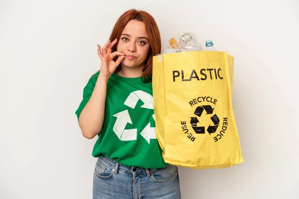 Young Caucasian Woman Recycled Plastic Isolated White Background Fingers Lips — 图库照片