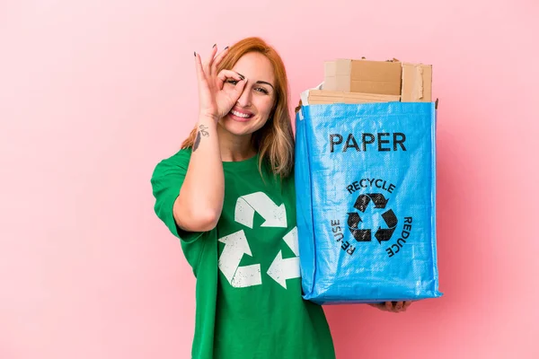 Young Caucasian Woman Recycled Paper Isolated Pink Background Excited Keeping — 스톡 사진