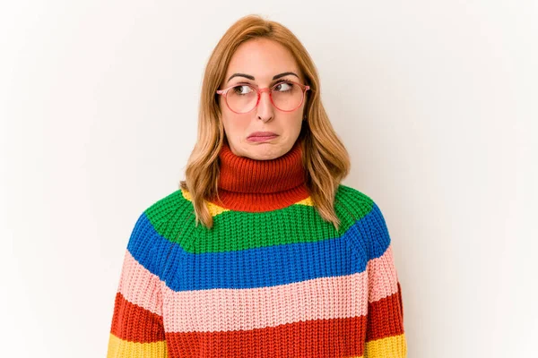 Young Caucasian Woman Wearing Sweater Stripes Isolated White Background Confused — Zdjęcie stockowe