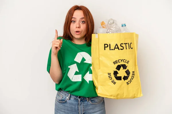 Young Caucasian Woman Recycled Plastic Isolated White Background Having Some — Fotografia de Stock