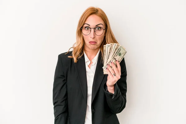 Young Business Caucasian Woman Holding Banknotes Isolated White Background Shrugs — Foto de Stock
