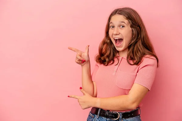 Little Caucasian Girl Isolated Pink Background Excited Pointing Forefingers Away — Stock Photo, Image