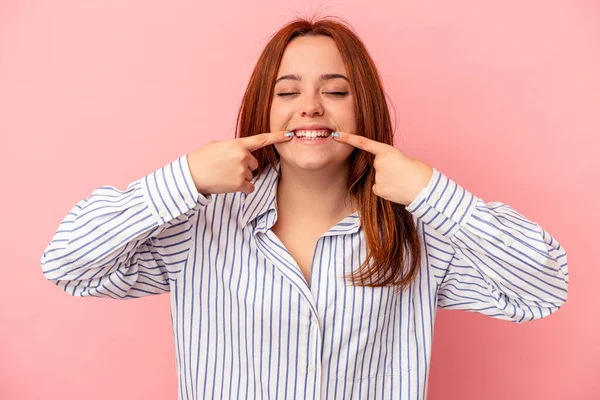 Young Caucasian Woman Isolated Pink Background Smiles Pointing Fingers Mouth — Stock Photo, Image